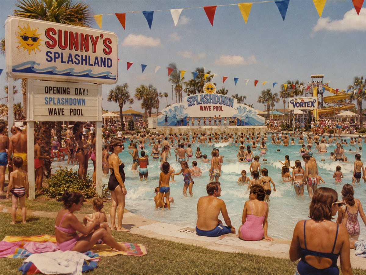 1980s photo of crowds enjoying the brand-new Splashdown Wave Pool